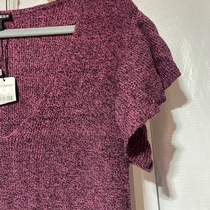 Brand new w/ tags Express pink with black . This is a sweater dress material